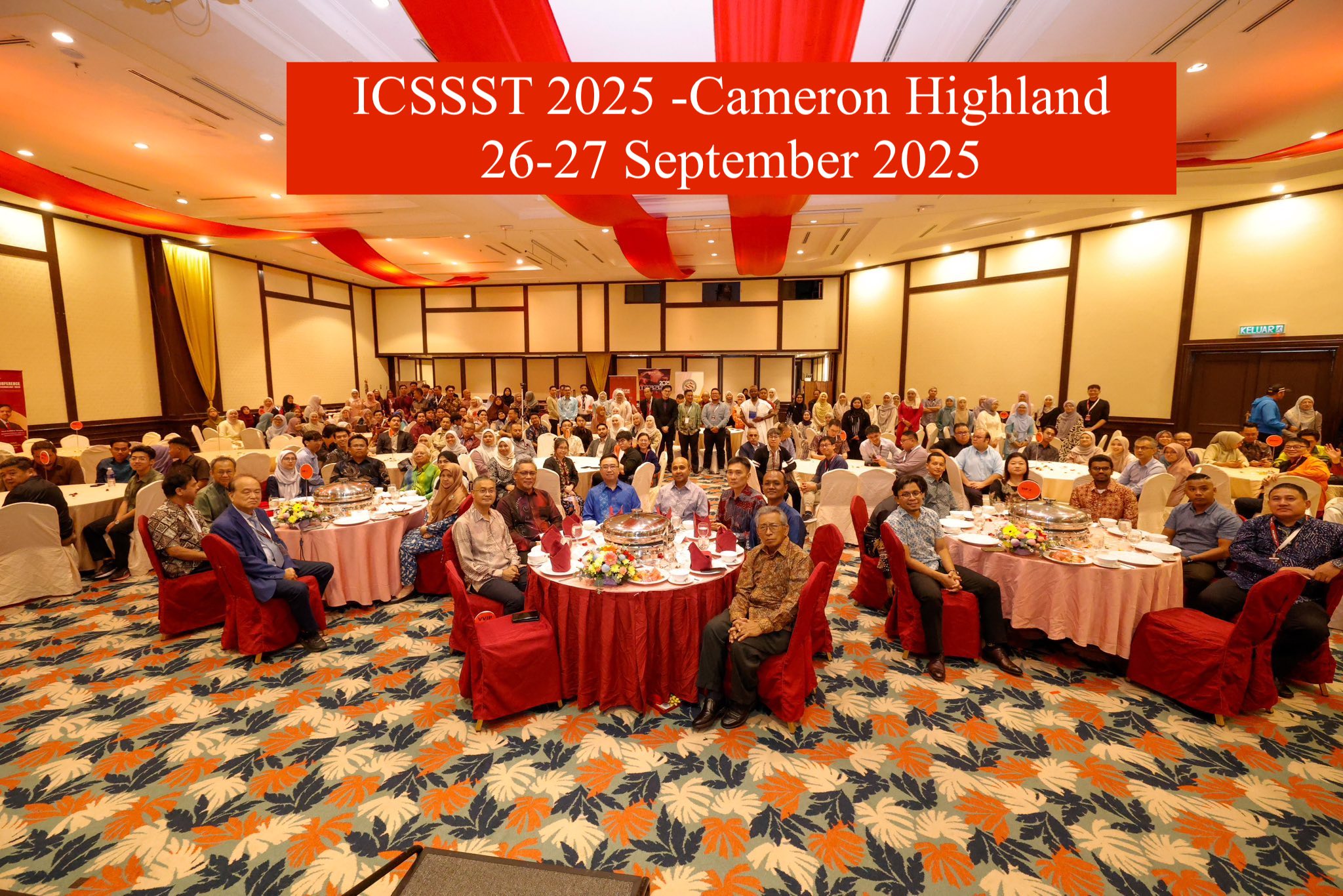 A group of people sitting at tables
Description automatically generated