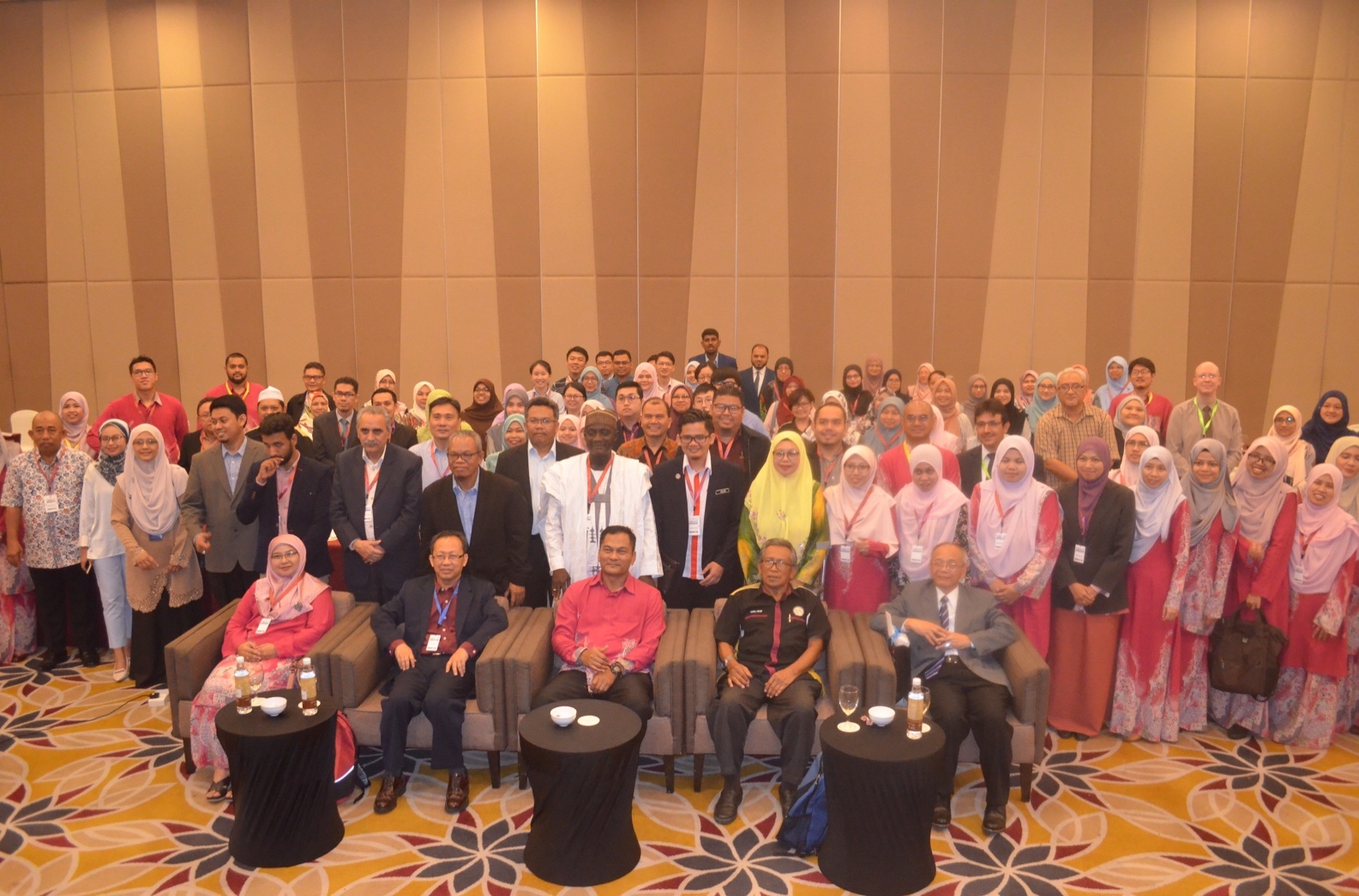 A group of people in a room
Description automatically generated with medium confidence