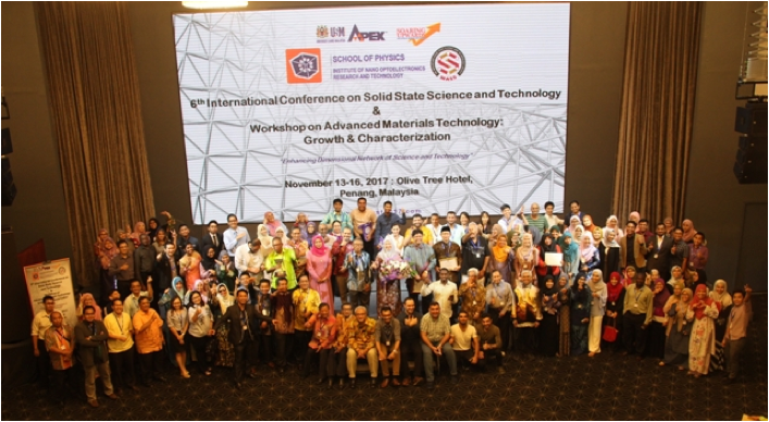 A group of people posing for a photo
Description automatically generated with medium confidence