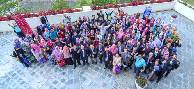 A large group of people posing for a photo
Description automatically generated