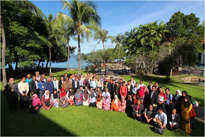 A group of people posing for a photo
Description automatically generated with medium confidence